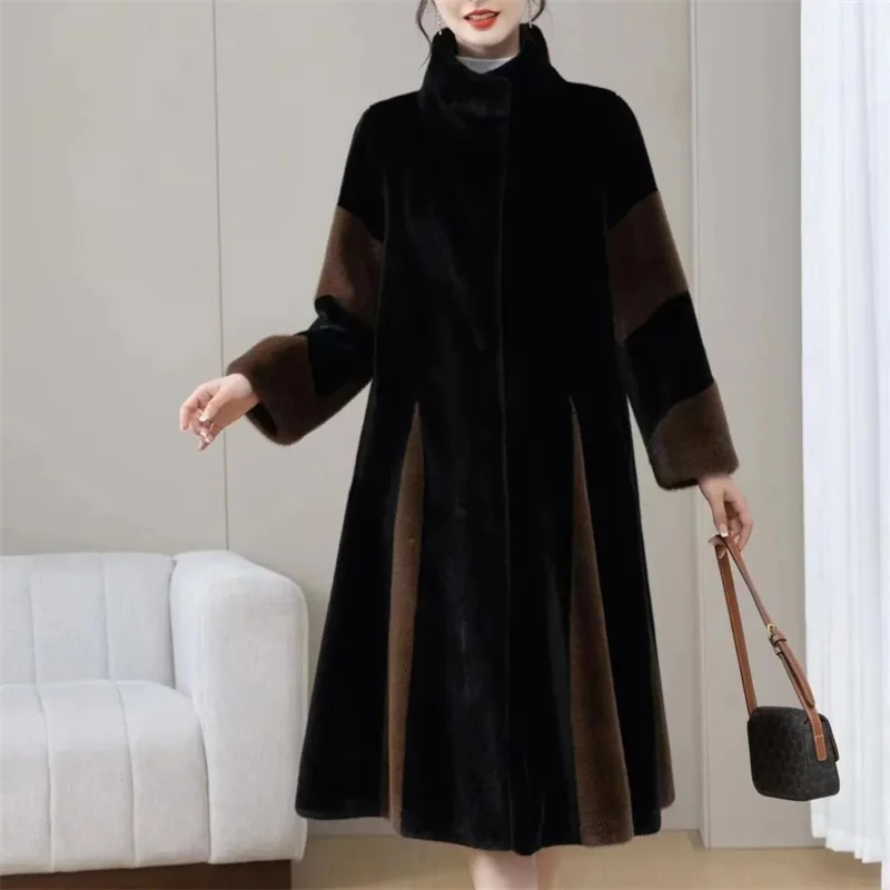 Otoño Invierno mujer chaqueta larga de piel integrada 2025 mujer de manga larga abrigo de piel sintética señoras cuello alto Tops de felpa prendas de vestir