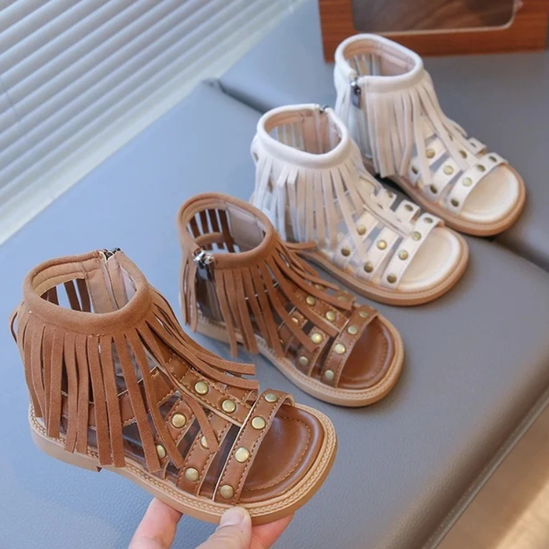 

Детские летние сандалии с открытым носком | Ботинки-гладиаторы с бахромой и заклепками | Римские сандалии на молнии для девочек, лето 2026