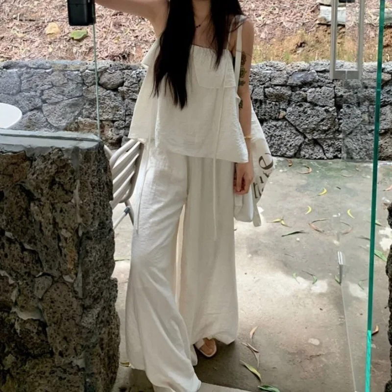 

Cool white fashion set for women's summer 2025 fashion new style with ruffled edge suspender pants skirt two-piece set