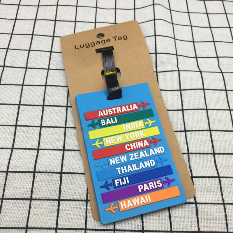 Etiqueta de equipaje de PVC con nombre de ciudad mundial, identificador de silicona, accesorios de viaje, 1 unidad