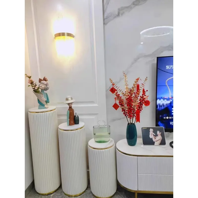 

Simple living room TV next to floor-to-ceiling round new Chinese light luxury decorative ornaments display rock slab flower shel