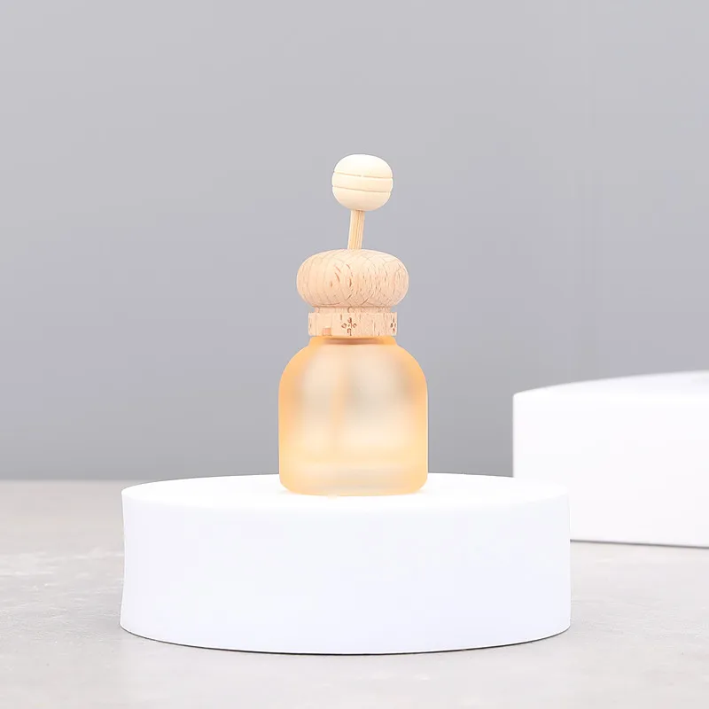 Bottiglia di profumo da 10 ml in vetro con coperchio in legno Deodorante per auto Ornamento Bottiglia vuota per styling auto per diffusore di oli essenziali
