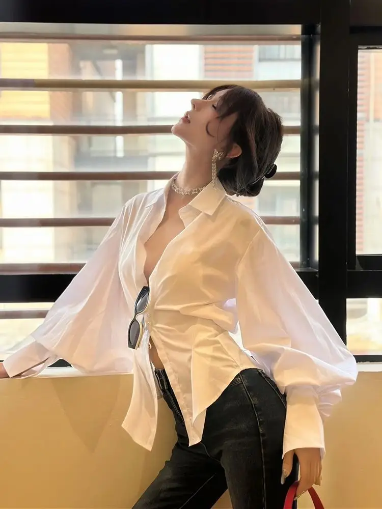 Chemise française à manches lanternes pour femmes au printemps de 2025, haut plissé pincé à la taille fermée pour rendre l'apparence mince et élégante