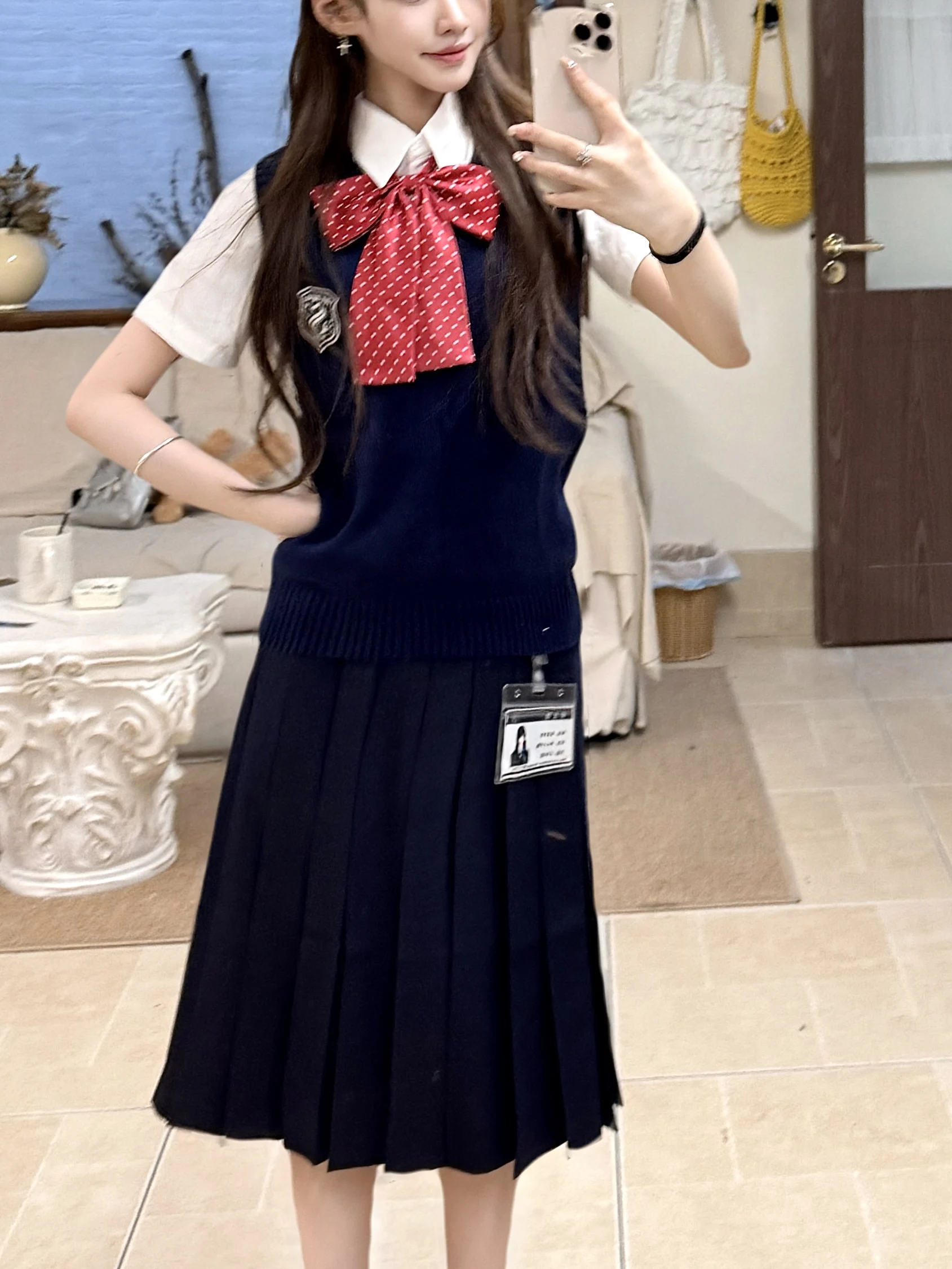 

Японский комплект из вязаного жилета с V-образным вырезом и юбки миди для женщин (для школы)