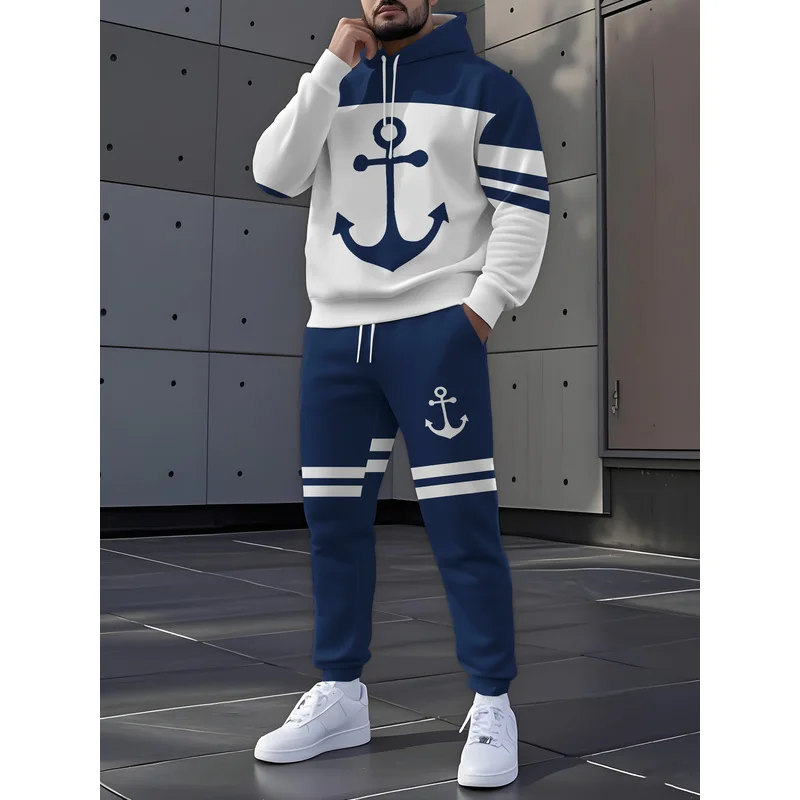 L'ensemble de vêtements de sport décontractés pour hommes comprend un sweat-shirt à capuche et un pantalon à motifs en blocs de couleurs bleu et blanc.