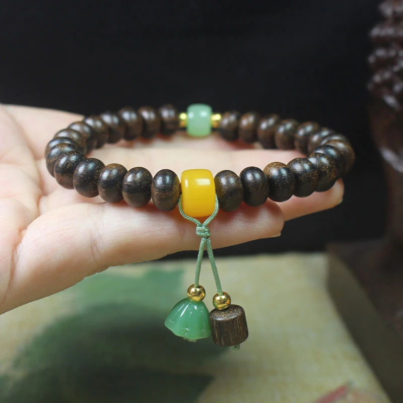 Tiger stripe agarwood abacus bead bracelet with small lotus pendant and Buddhist prayer beads - view 4