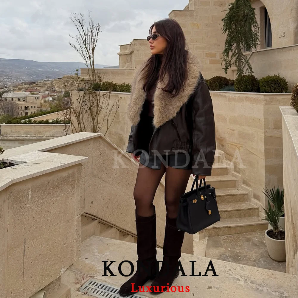 KONDALA الشارع الشهير الفراء طوق سترات من الجلد النساء جيوب طويلة الأكمام المتضخم معاطف موضة 2025 الخريف الشتاء أبلى