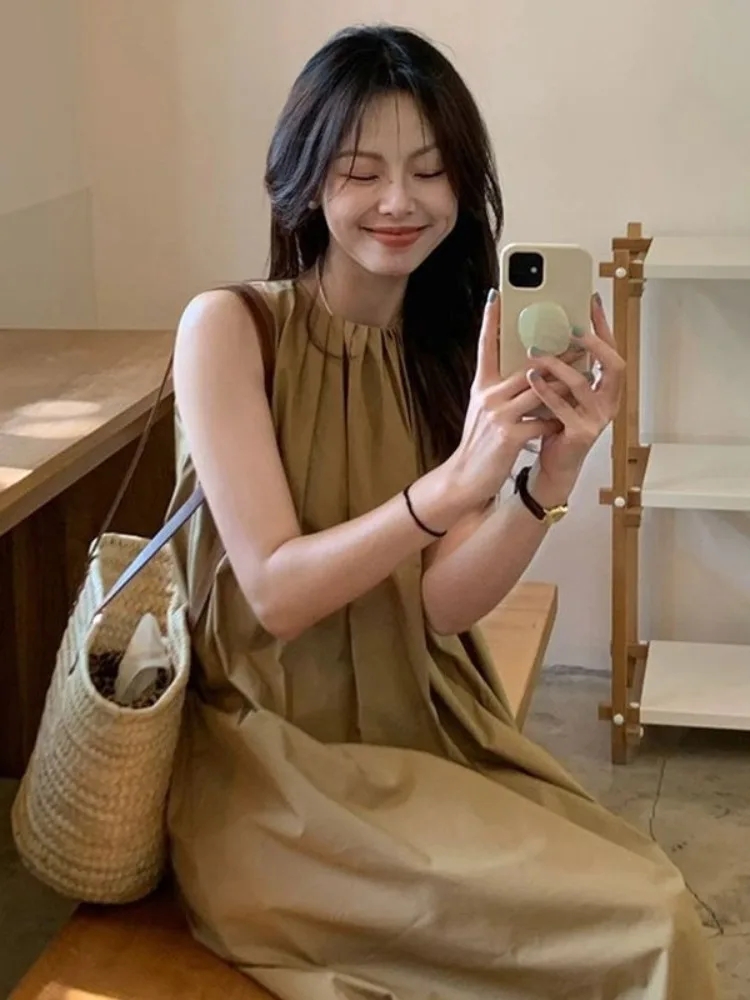 เสื้อกั๊กผู้หญิงทรงหลวมสไตล์เกาหลีสำหรับฤดูร้อน ผ้าบางเบา ใส่สบาย ช่วยพรางหุ่น  ชุดลำลองอเนกประสงค์