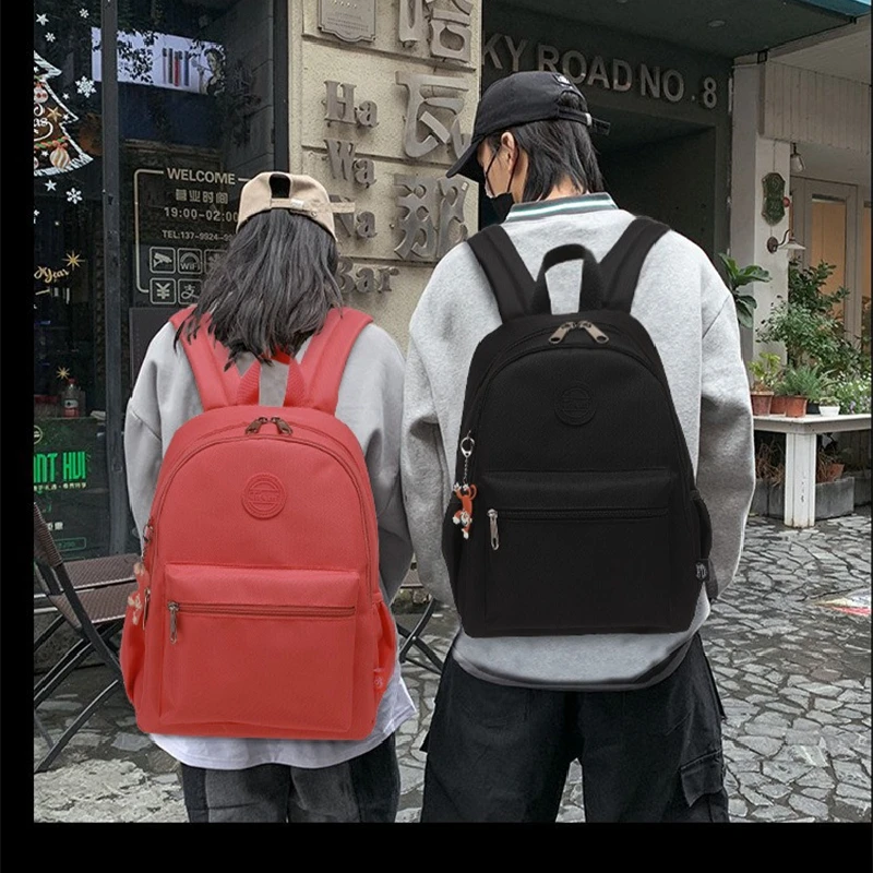 Lightweight Waterproof High Quality Casual A4 Large Capacity Men Women Backpack Schoolbag Travel Bag Black Blue White Red M1789