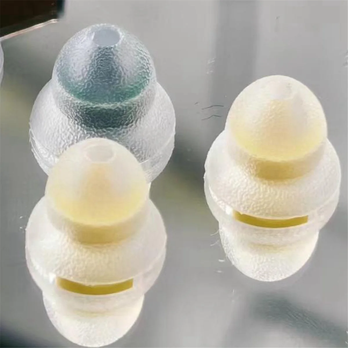 Tang Sancai Almohadillas de silicona bloqueadas con sistema de agarre de liberación de presión con aislamiento de ruido