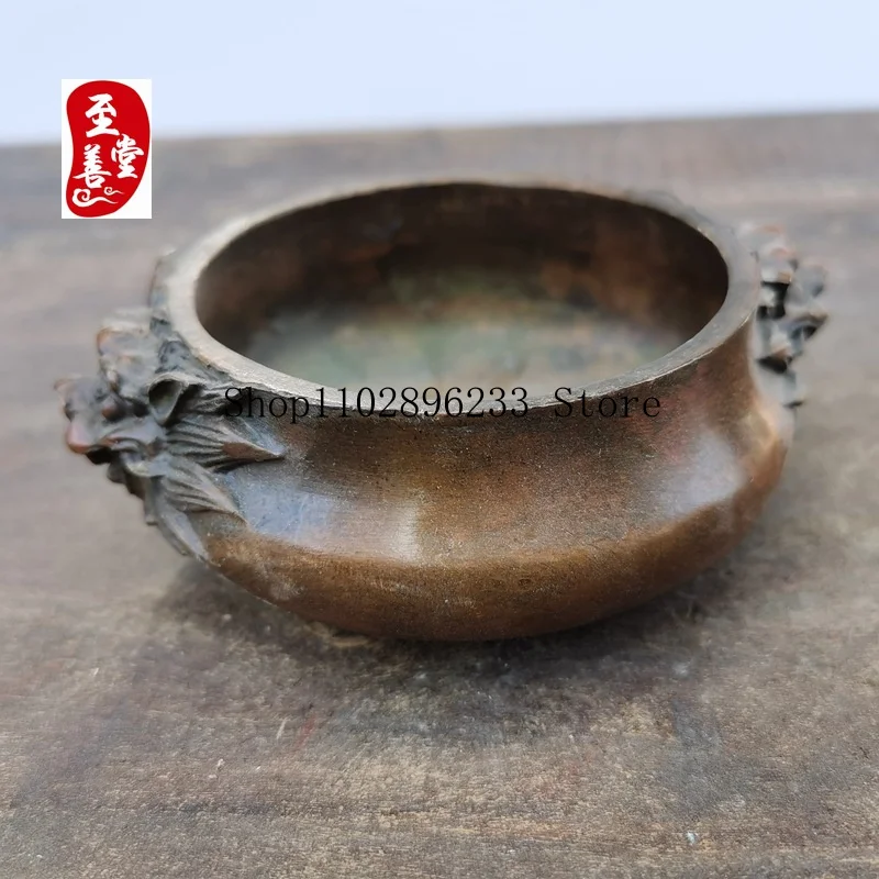 Antique-style copper alloy decorative piece for living room, featuring a dragon head and ear-shaped design, with an aged patina1