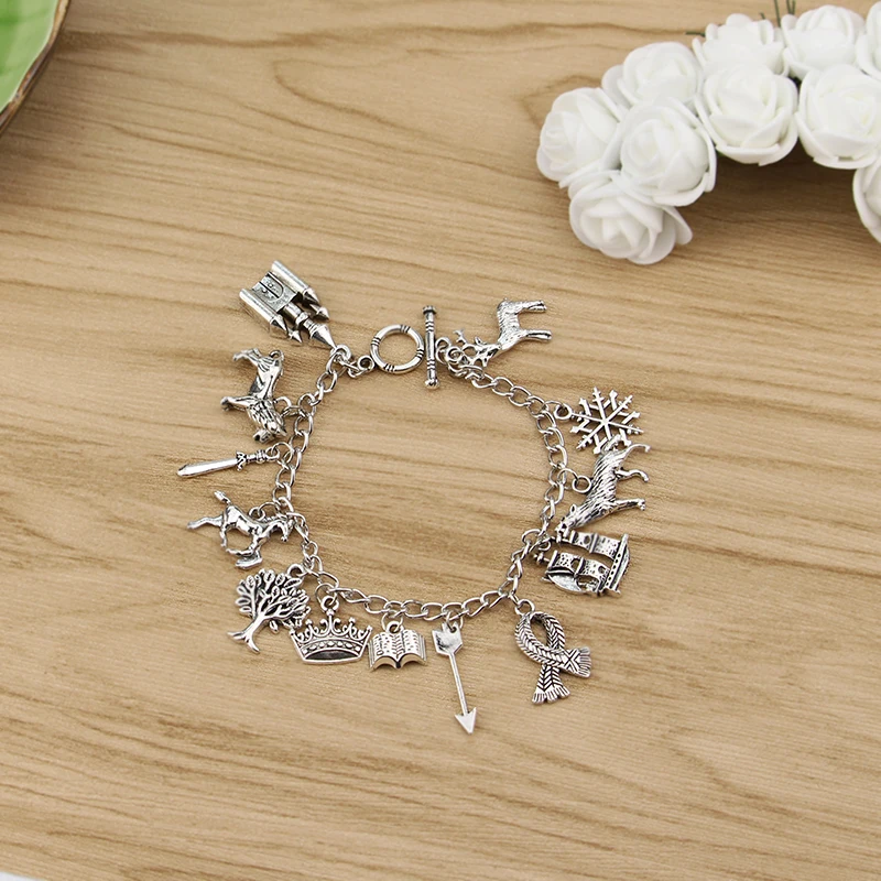 Chronicles of Narnia inspired bracelet Reindeer Snowflake Wolf Throne Ship Aslan charm bracelet