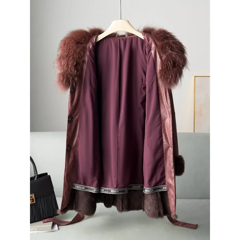 Outono e inverno novo casaco longo de pele integrado feminino couro genuíno gola de pele de guaxinim pele de coelho, fino e fino e quente