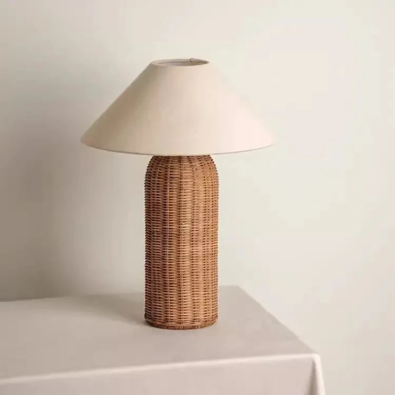 

Modern hand-woven rattan table lamp with fabric shade
