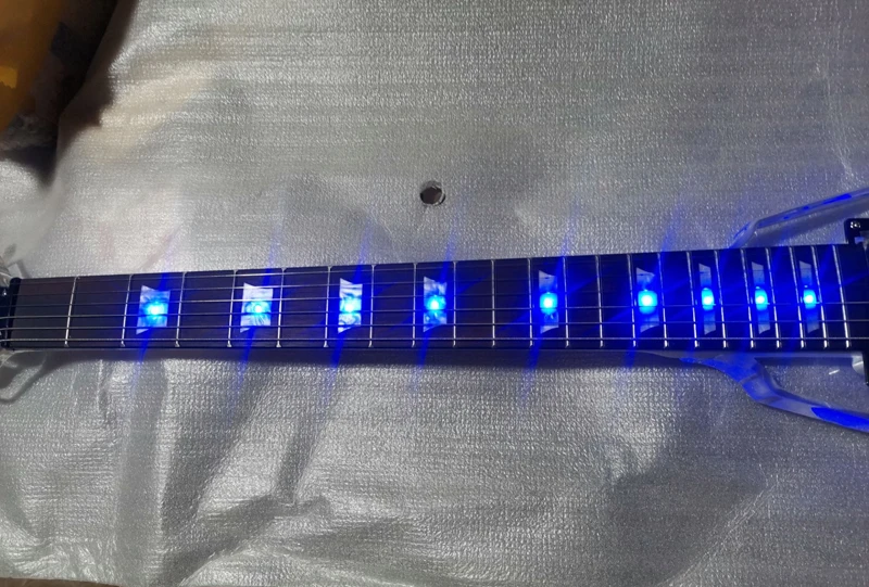 Good quality Fly V style acrylic electric guitar with blue led light