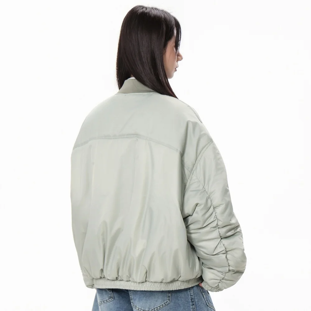 Doudoune d'hiver femme hiver 2025 veste bouffante de créateur col côtelé noir mode femme veste bombardier isolée