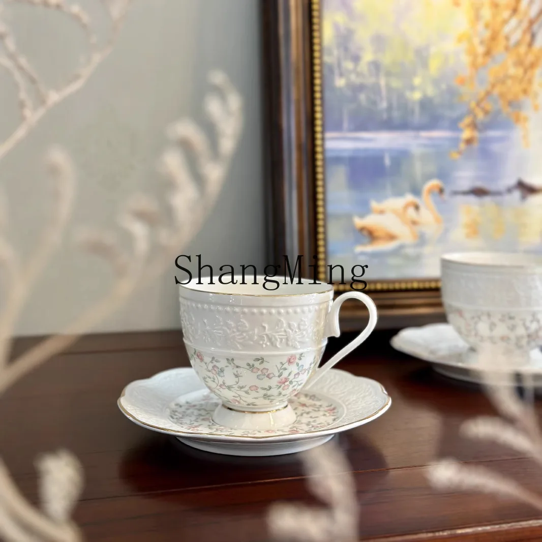 

PYH bone china is light and transparent, elegant, small fresh relief coffee cup saucer, afternoon tea coffee cup