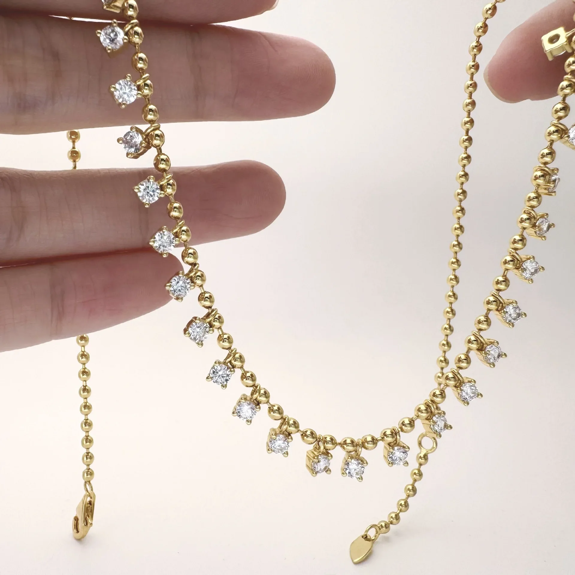 

Womens 18K Gold Necklace Starry Sky Beads High Carbon Diamond Necklace Fashionable and Versatile AU750 Clavicle Chain Wholesale