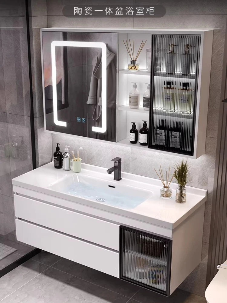 

Керамический умывальник в скандинавском стиле с интегрированным шкафчиком для ванной комнаты, современный и простой дизайн, комбинация тумбы и умывальника.