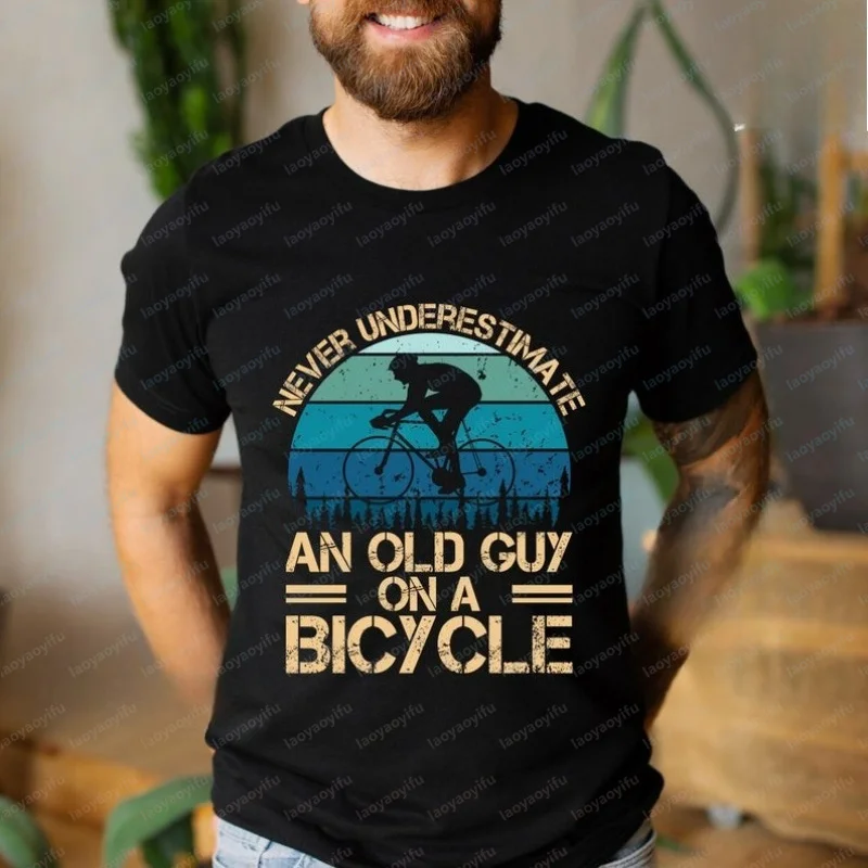 Funny Cyclist Cotton T-Shirt: Never Underestimate An Old Guy on A Bicycle Graphic T Shirts Harajuku Mens T Shirts Streetwear Top