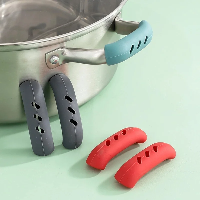 Lot de 2 poignées de poêle en silicone pour isolation thermique, cache- oreille, cocotte, poêle, outil de cuisine Lot de 2 poignées de poêle en silicone pour isolation thermique, cache- oreille, cocotte, poêle, outil de cuisine