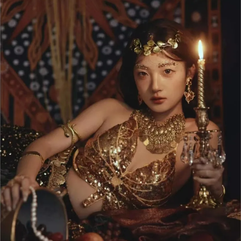 A new style of exotic travel photography with golden top starry chiffon pleated skirt