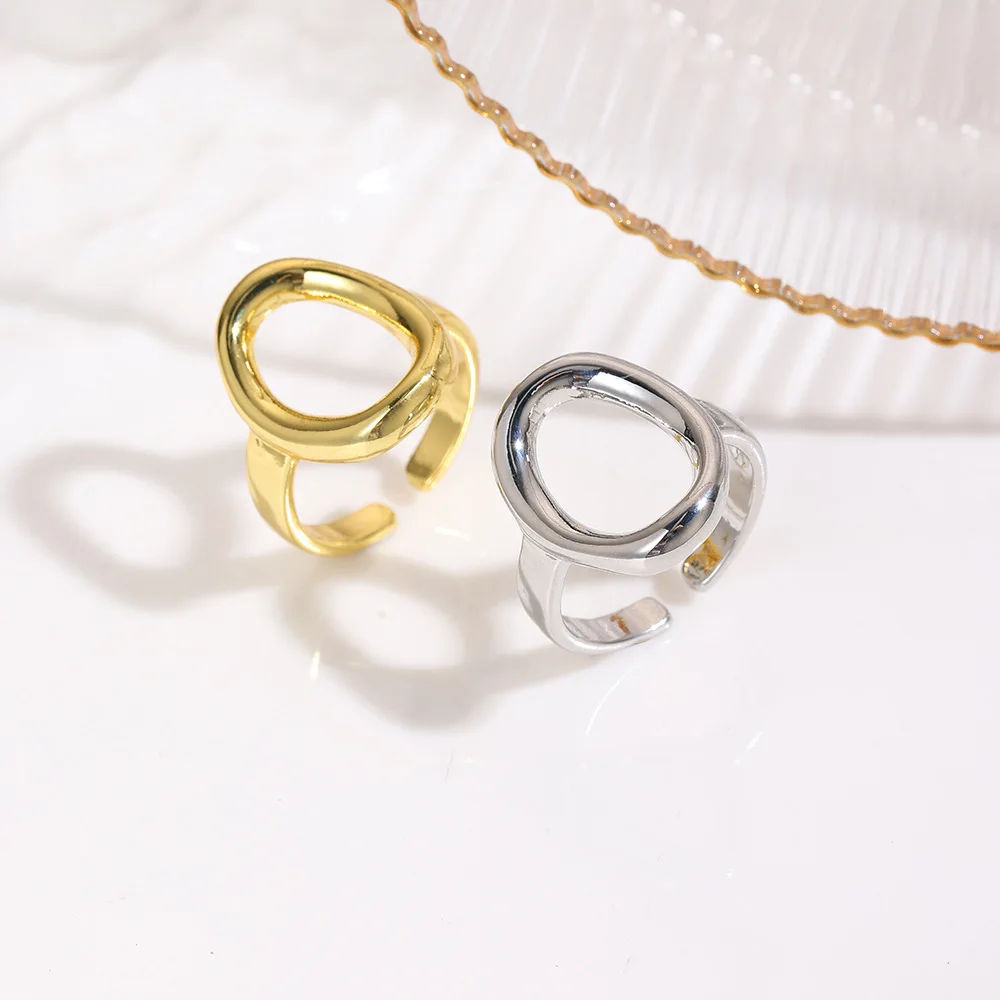 Personalized fashion geometric smooth oval open ring copper light luxury hollow simple adjustable men's and women's ring jewelry
