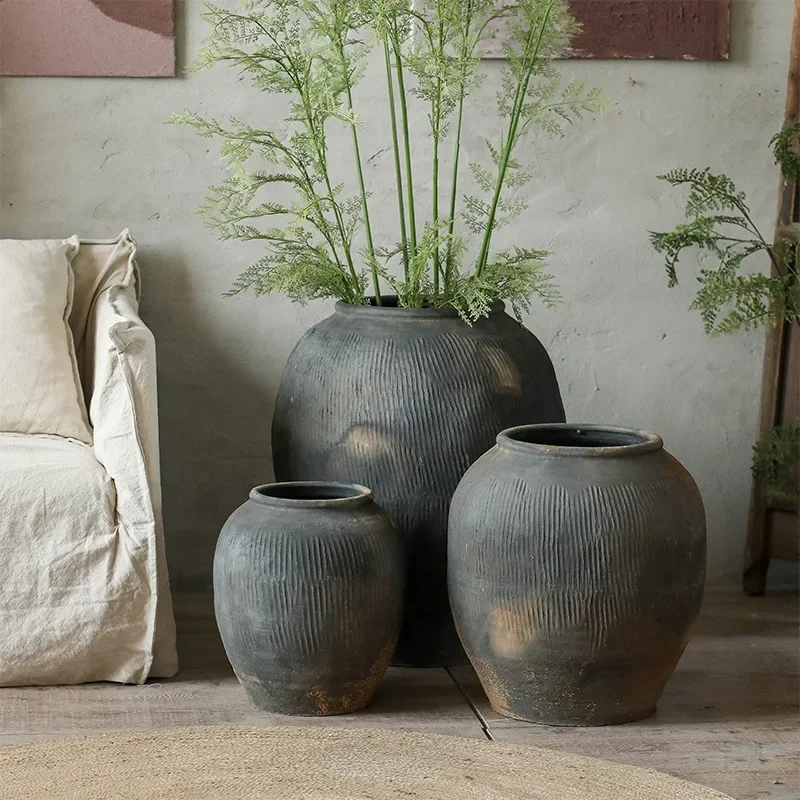 

Big round belly gray pottery pot living room landscaping and quiet wind decoration B&B coarse pottery pot retro earthenware