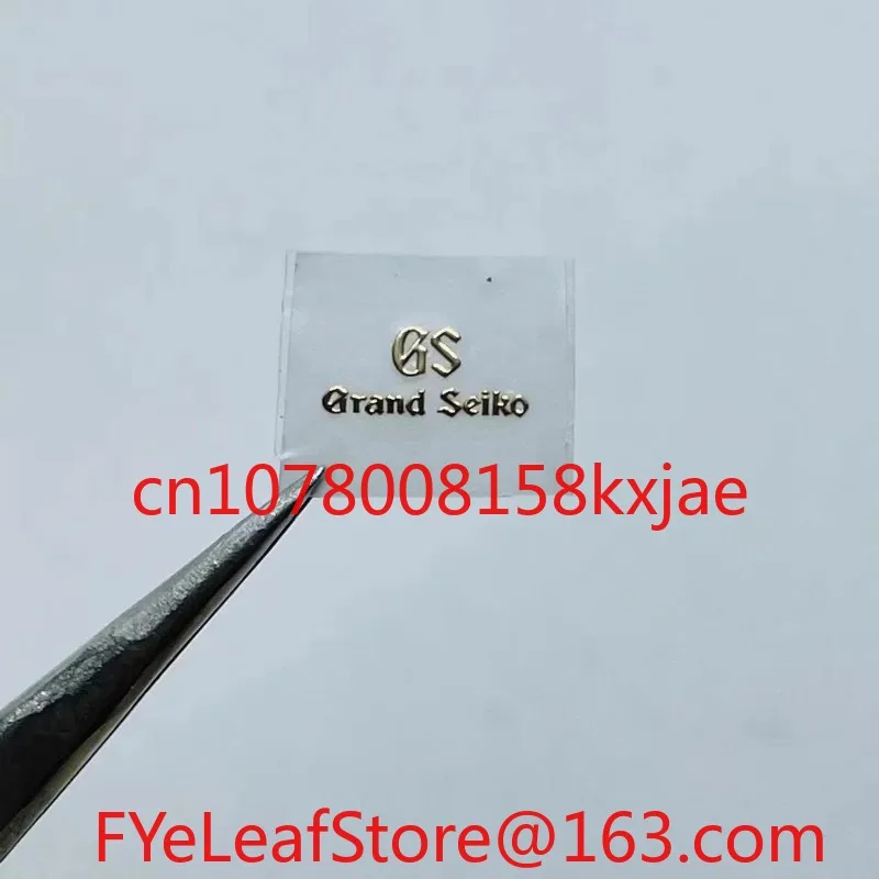 شاهد ترصيع الشعار الحرفي، وملصقات الشعار المعدنية، وملصقات الملصقات على شكل حرف S