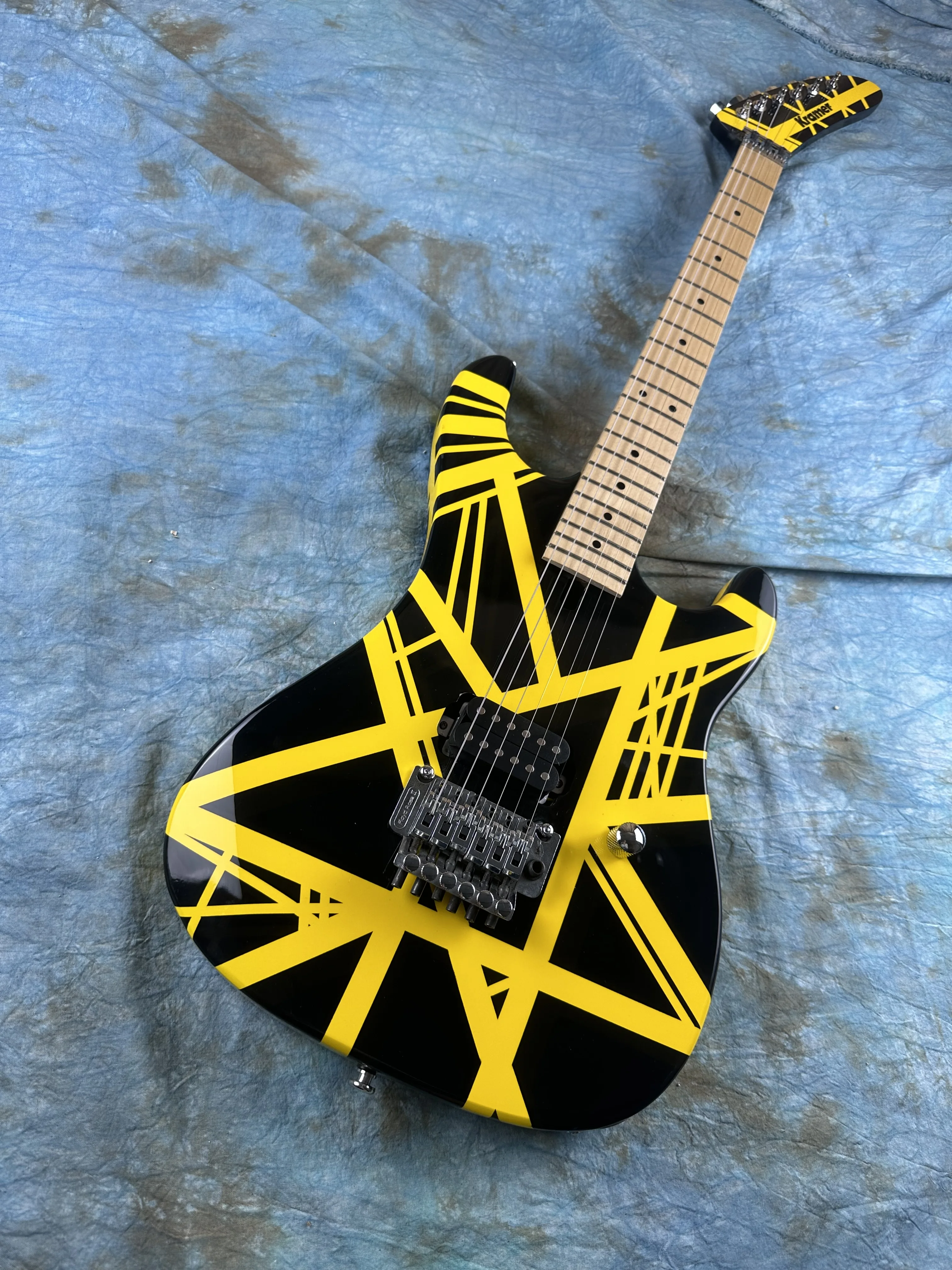 

5150 electric guitar, imported alder body, Canadian maple fingerboard, signed, classic yello and white stripes, lightning packag