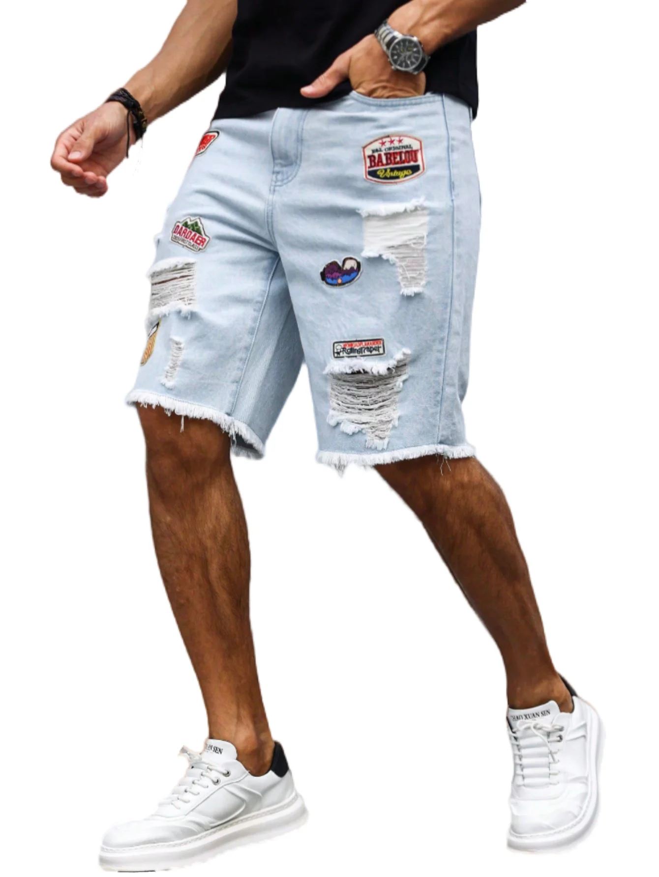 Men's light blue ripped denim shorts with patches for summer. Frayed edge design, showcasing street - style and a casual vibe.