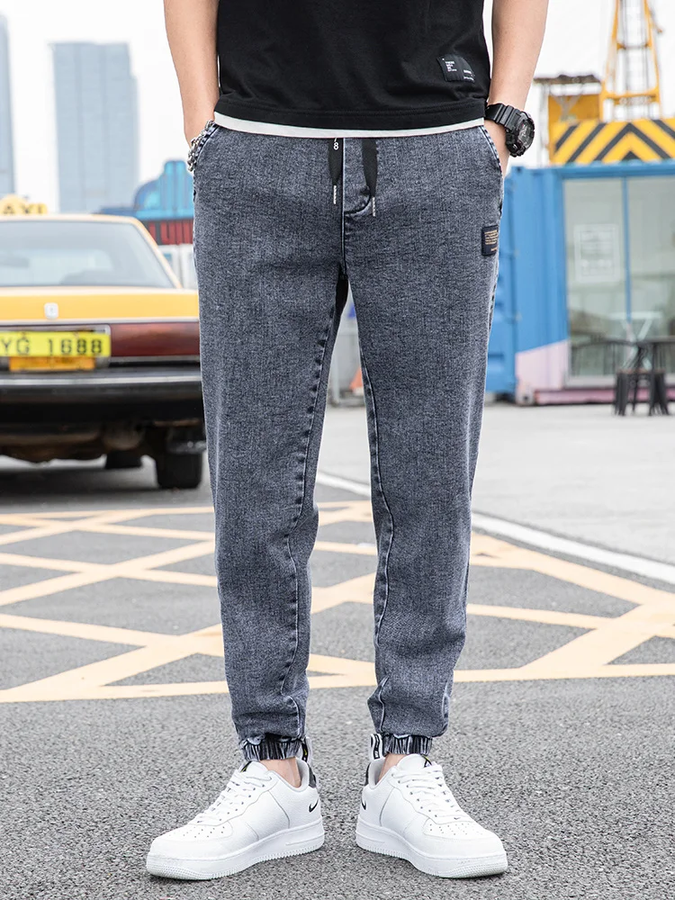 Nowe Duże Rozmiary 8XL Męskie Jeansy Jogger Streetwear Czarne Niebieskie Casualowe Spodnie Cargo Denimowe Elastyczne Bawełniane Spodnie Taper Jeansy Luźne Spodnie