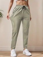 Pantalones casuales de fibra de hielo de alta elasticidad para mujer de secado rápido con bolsillos con cremallera cintura con cordón ajustable ligero
