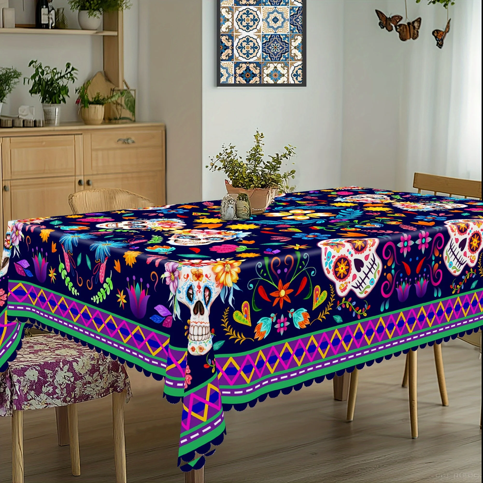 One Dia de los Muertos (Day of the Dead) celebration tablecloth, colorful skulls, Mexican floral pattern decoration.PMJ