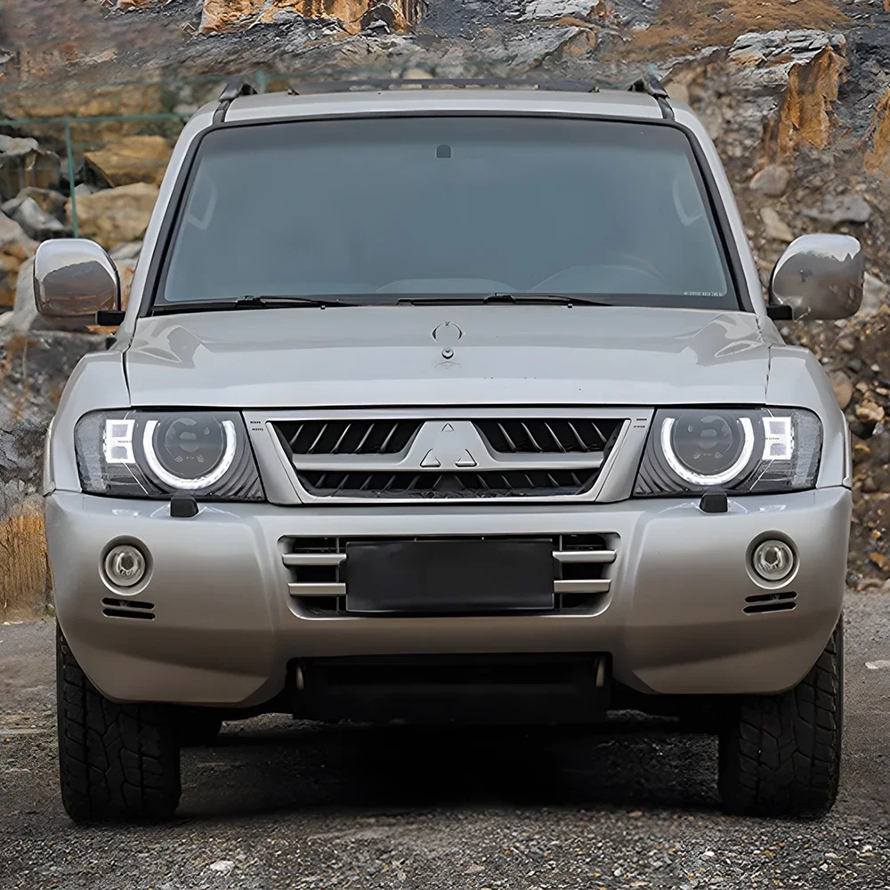 

Для Mitsubishi Pajero V73 2004-2014 светодиодные автомобильные фары в сборе, обновленный стиль Defender, динамические аксессуары, линзы проектора автомобиля