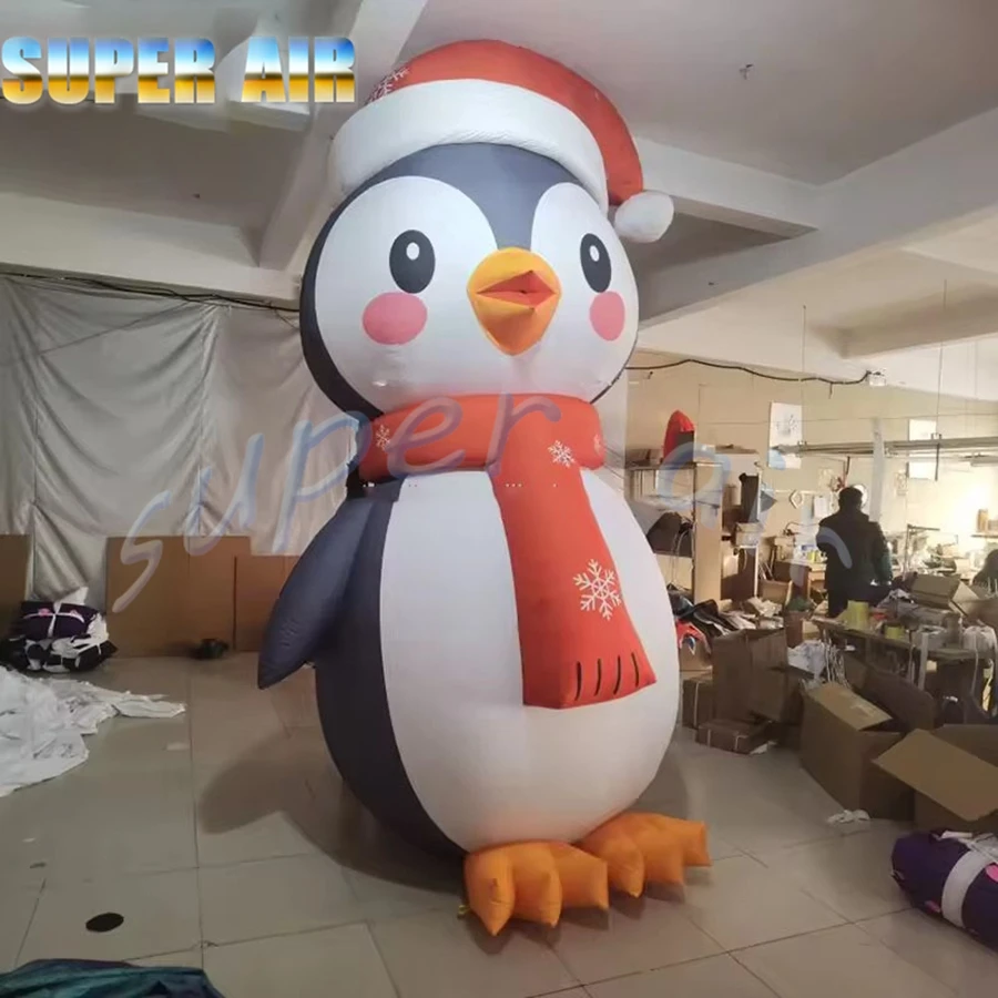 Pinguino natalizio gonfiabile gigante dal design speciale natalizio con cappello per la decorazione della festa