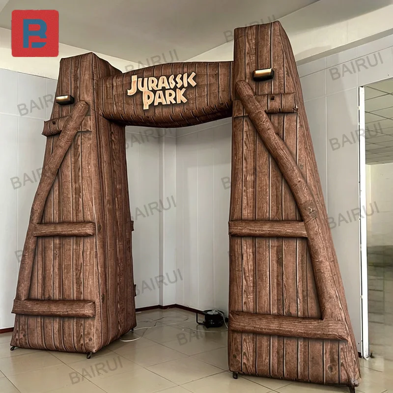 Entrance arch of the outdoor dinosaur-themed inflatable park. Inflatable Jurassic arch.