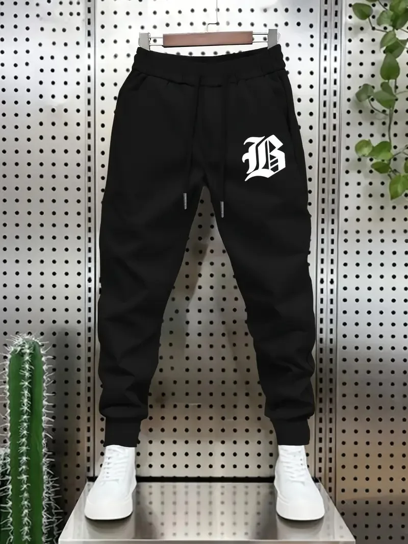 

The new men's trousers for Spring and Autumn 2025 are soft casual and simple with letter prints