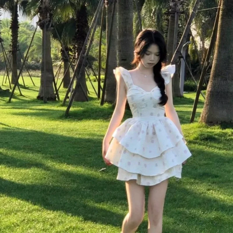 Dulce vestido de manga voladora Falda corta floral pequeña que abraza la cintura de hadas