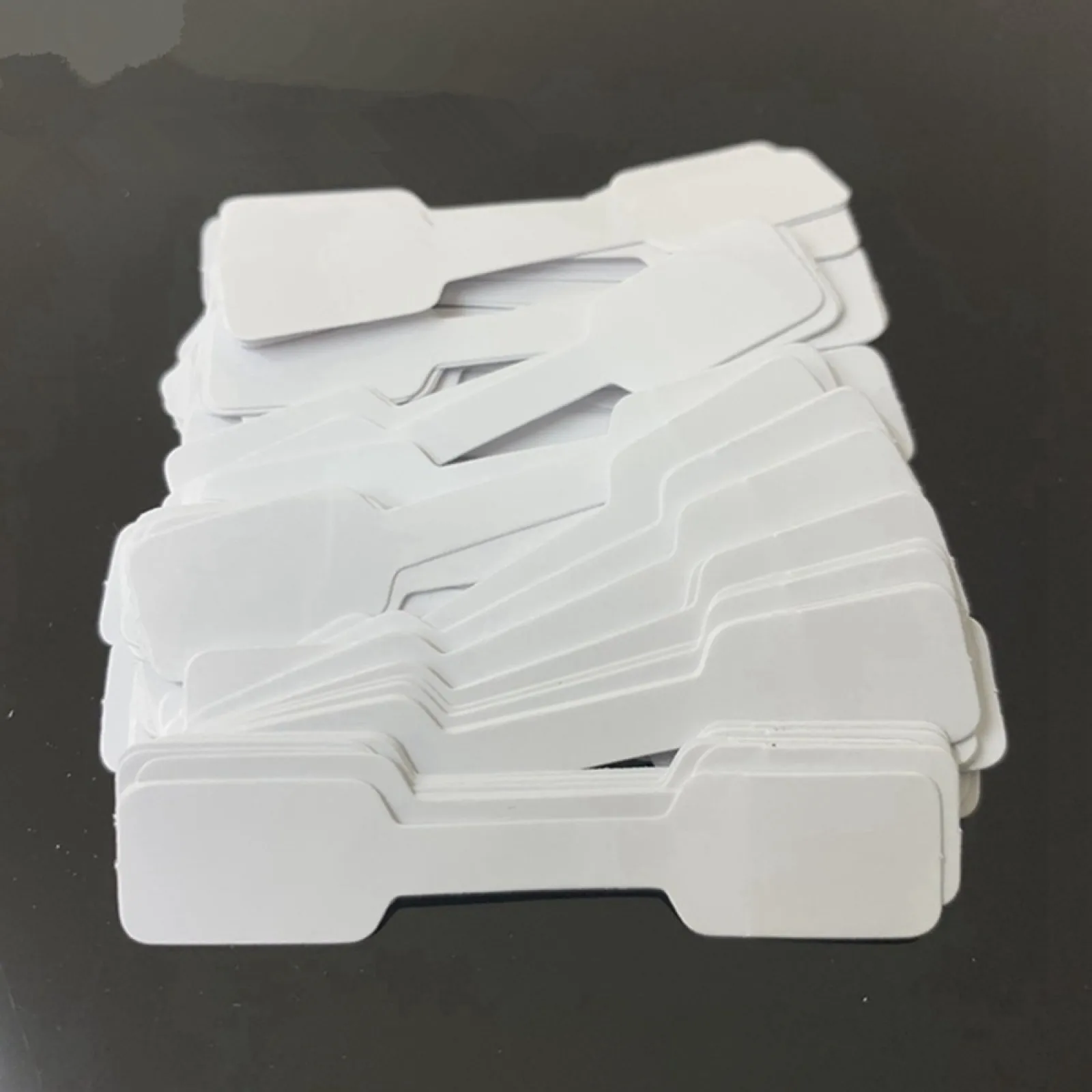 100 sztuk/partia przenośna pusta papierowa biżuteria z ceną biała etykieta Dumbell prostokątna naklejka na etykietę pierścionek bransoletka biżuteria metki