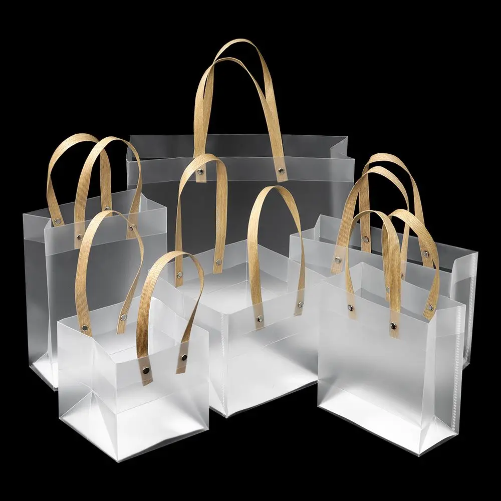 Tote traslucido sacchetti in PP smerigliato sacchetti regalo in plastica con manici forniture per decorazioni per sacchetti di gioielli di caramelle