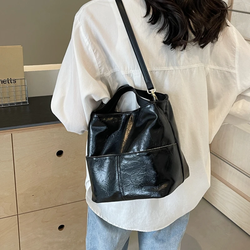 PU Simple Solid Bucket Hand Bags Large Capacity Fashion Versatile Commuting Shoulder Bags for Women 2024 Designer New Style