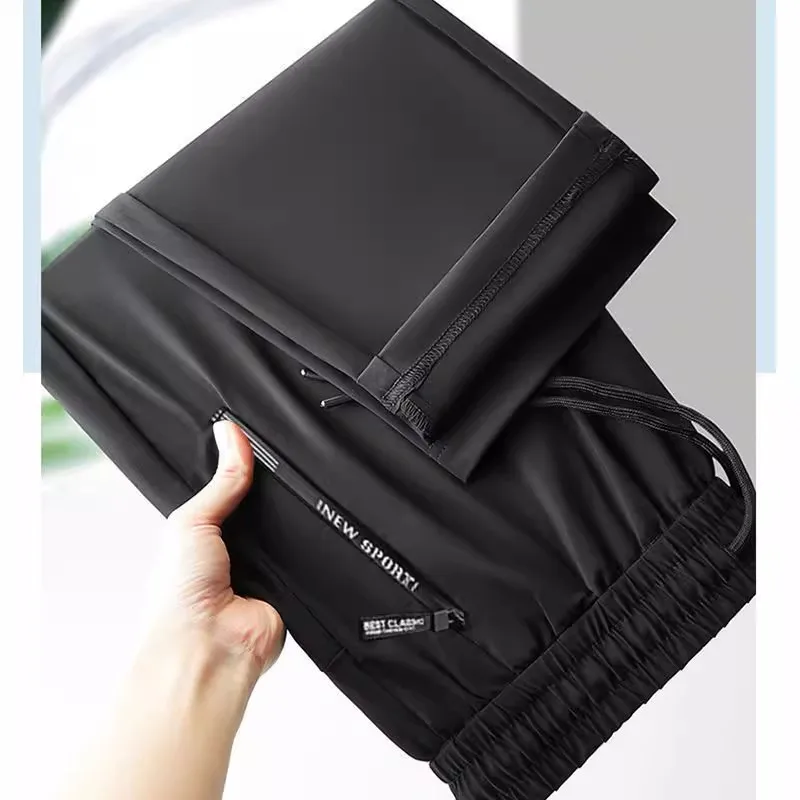 ใหม่ 2025 ชายผ้าไหมน้ําแข็ง Cool Feeling หลวมสบายๆกางเกงยาวกางเกงทํางานบางพร้อมซิป Kets สําหรับทํางาน