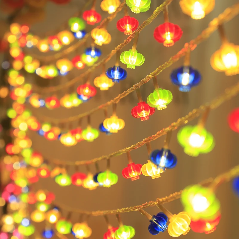 Spring Festival red lanterns, colorful lights flashing, string of stars all over the sky