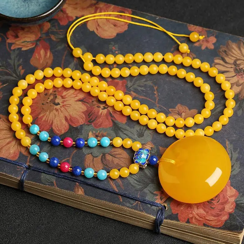 Beeswax peace , chicken oil yellow old , freeform amber chain, fish eye pendant, women's round bead sweater