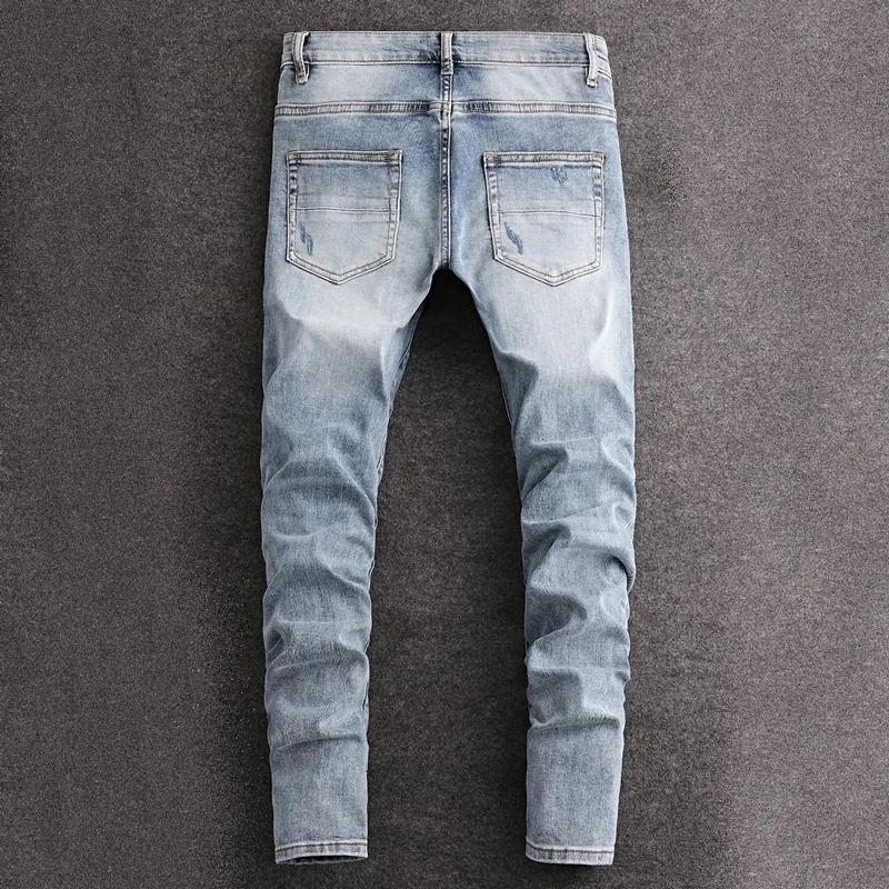 newy2k jeans with pleats, slim fit, elastic water wash,y2k nostalgic perforated patch, light blue jeans, hip-hop brand pan