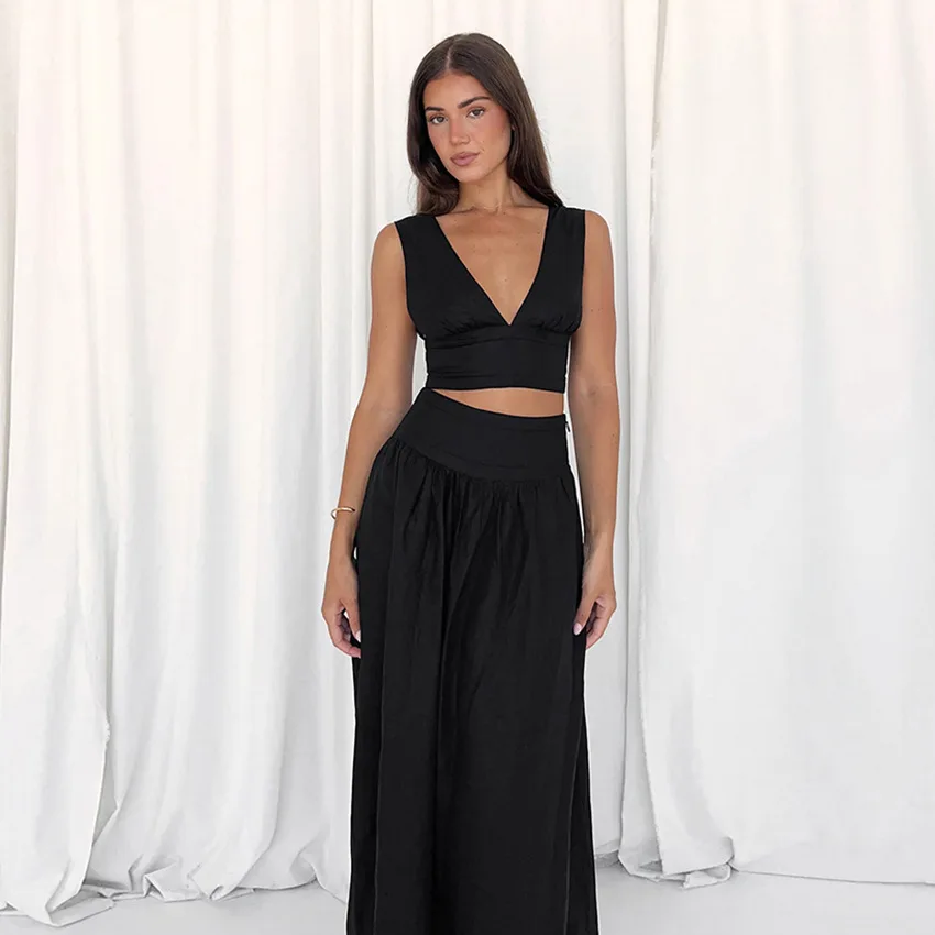 

Hot selling suspender vest, high waisted long skirt two-piece set, spring vacation style, black cotton and linen set wholesale