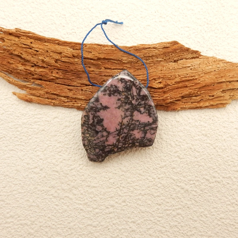 

Натуральный драгоценный камень родохрозит: бусины-подвески с боковым отверстием для самостоятельного изготовления украшений, 49x14x9 мм, вес 38,8 г