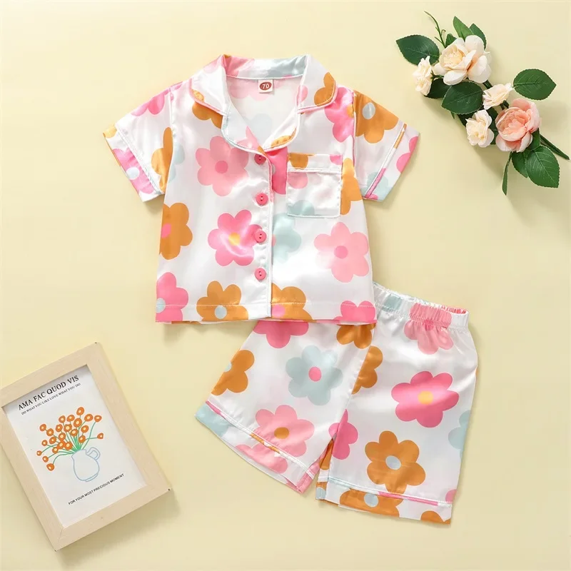 

EWODOS 1-5Years Toddler Kid Girl Pajamas Sets Casual Short Sleeve Lapel Neck Floral Print Buttons Tops + Loose Short Set Outfits