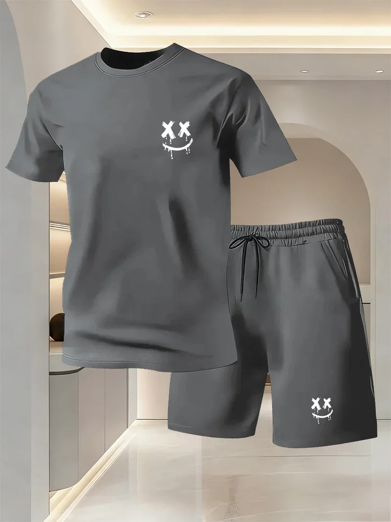 Ensemble de sport et de loisirs d'été pour hommes avec imprimé motif visage souriant, t-shirt ample à manches courtes, short de course à séchage rapide